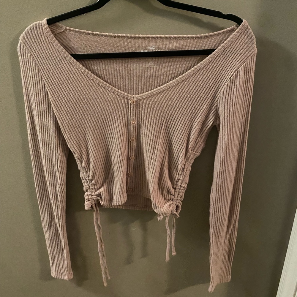 Pink long sleeved baby tee from hollister. from the "must-have collection"